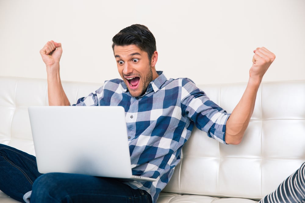 Man interacting in virtual corporate event held by Teambonders