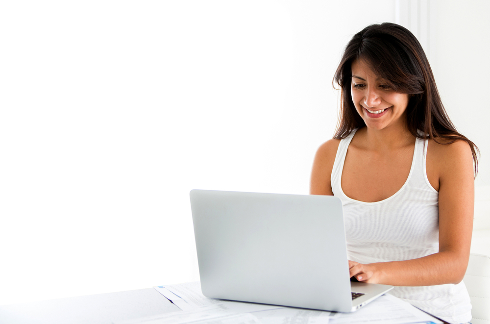 Woman video calling on laptop computer