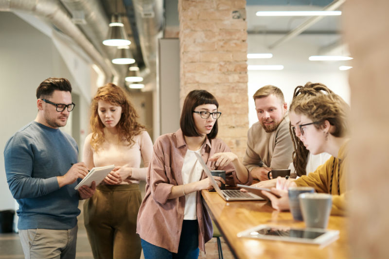 Employees collaborating in a team